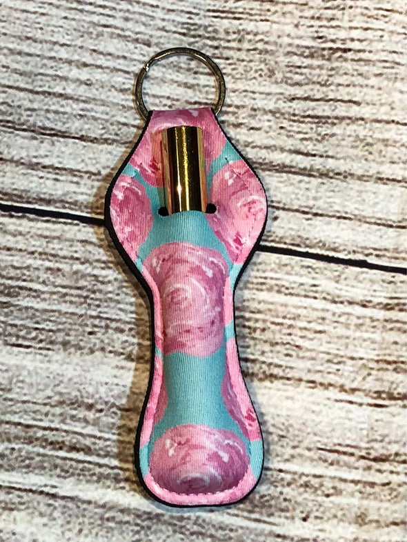 Keyring lip gloss  Pink roses teal background