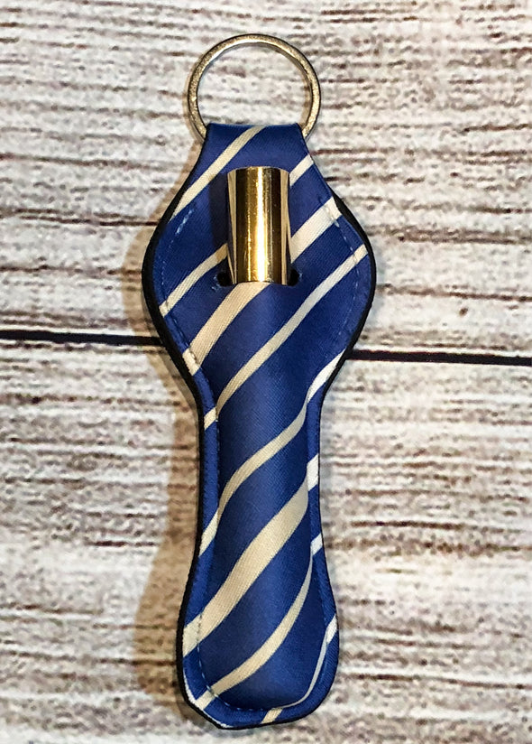 Lip gloss keyring holder  in a dark Navy with Gold stripes